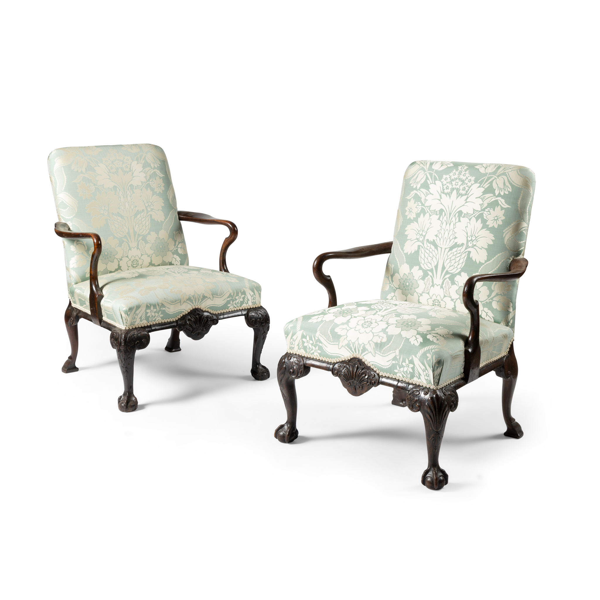 A PAIR OF WALNUT UPHOLSTERED ARMCHAIRS