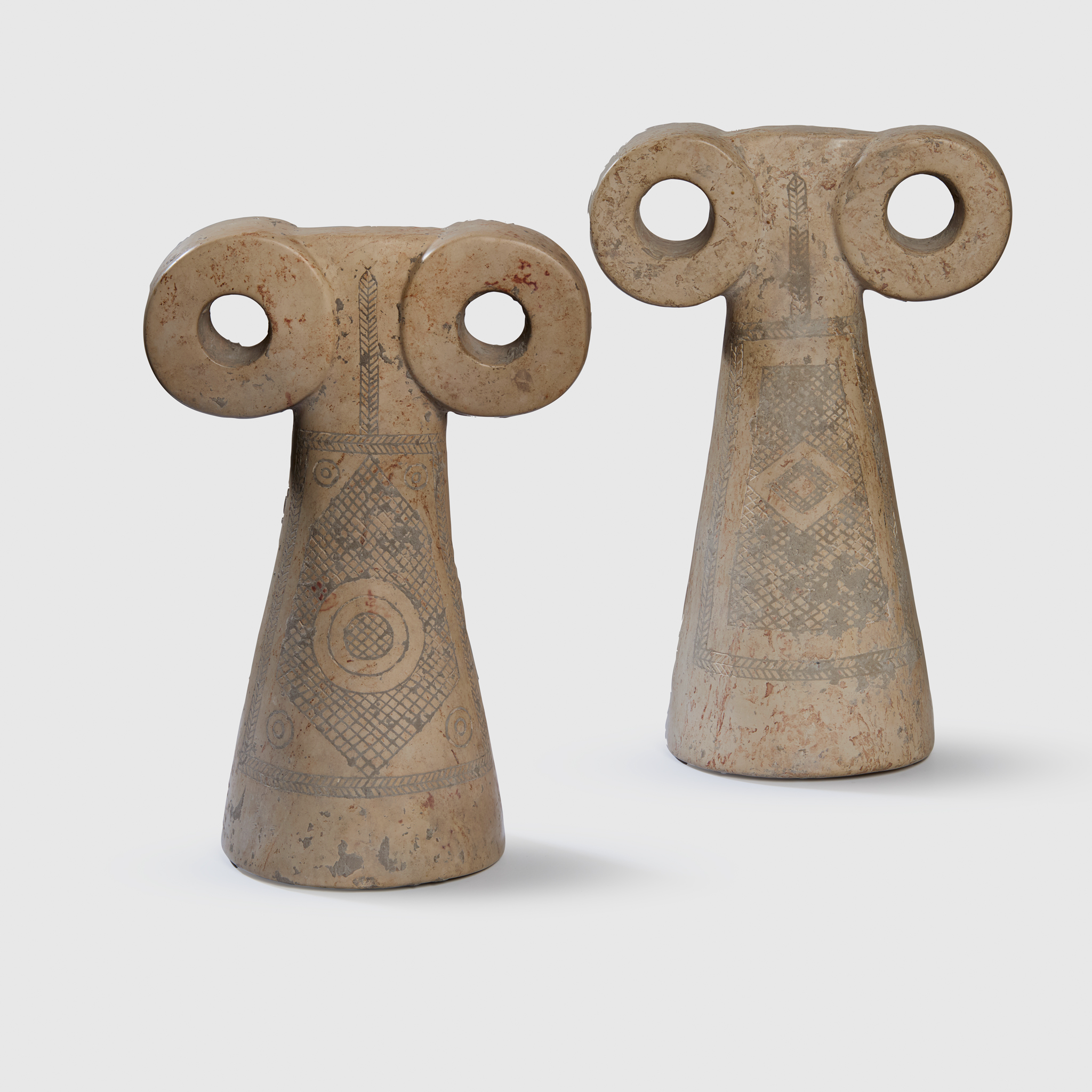 A PAIR OF "EYE IDOLS"