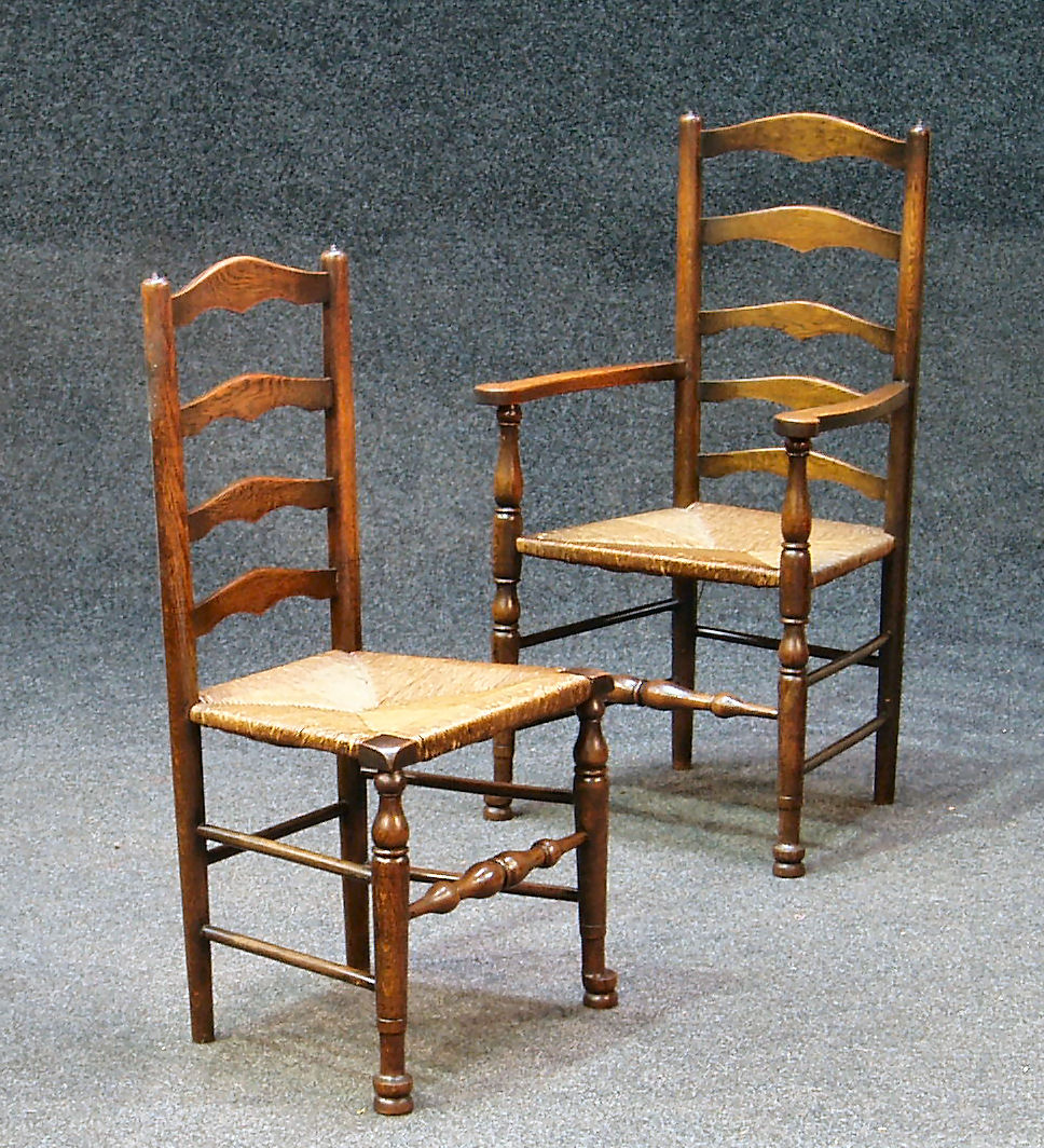 A set of six oak ladderback chairs,