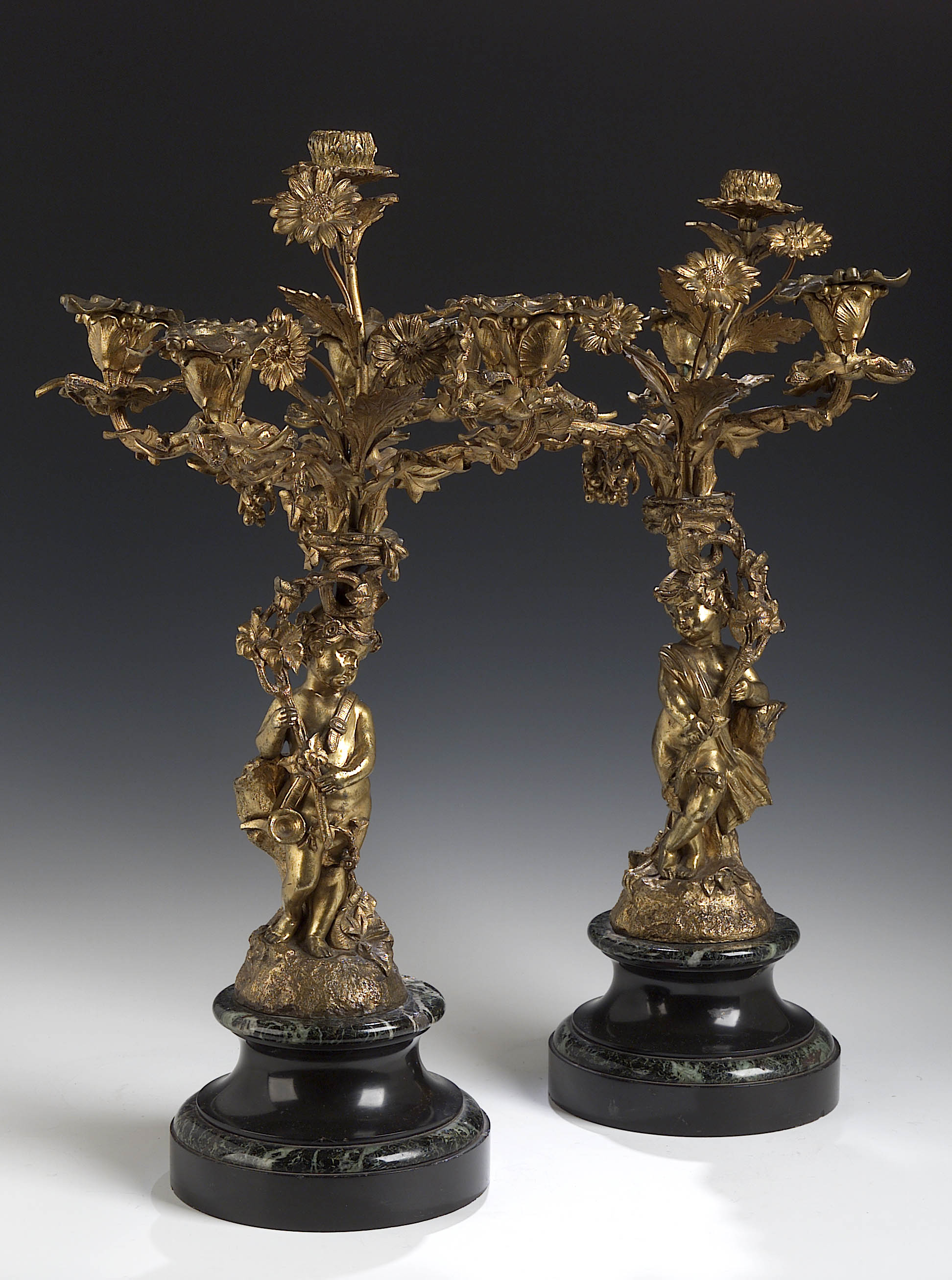 A pair of 19th century gilt brass table candelabra