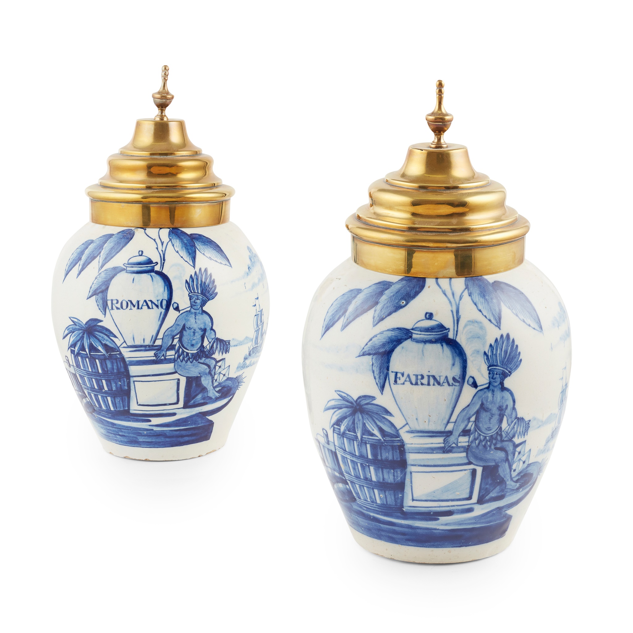 PAIR OF BLUE AND WHITE DUTCH DELFT TOBACCO JARS WITH BRASS COVERS