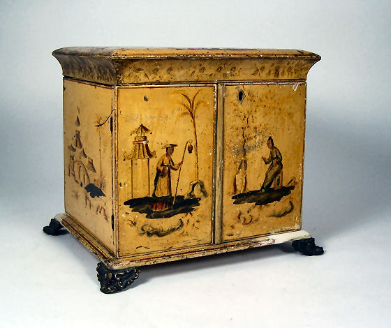 A 19th century yellow japanned table cabinet