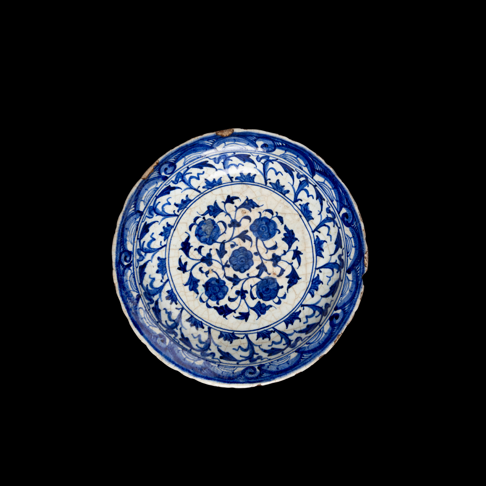 A STRIKING TIMURID BLUE AND WHITE POTTERY DISH