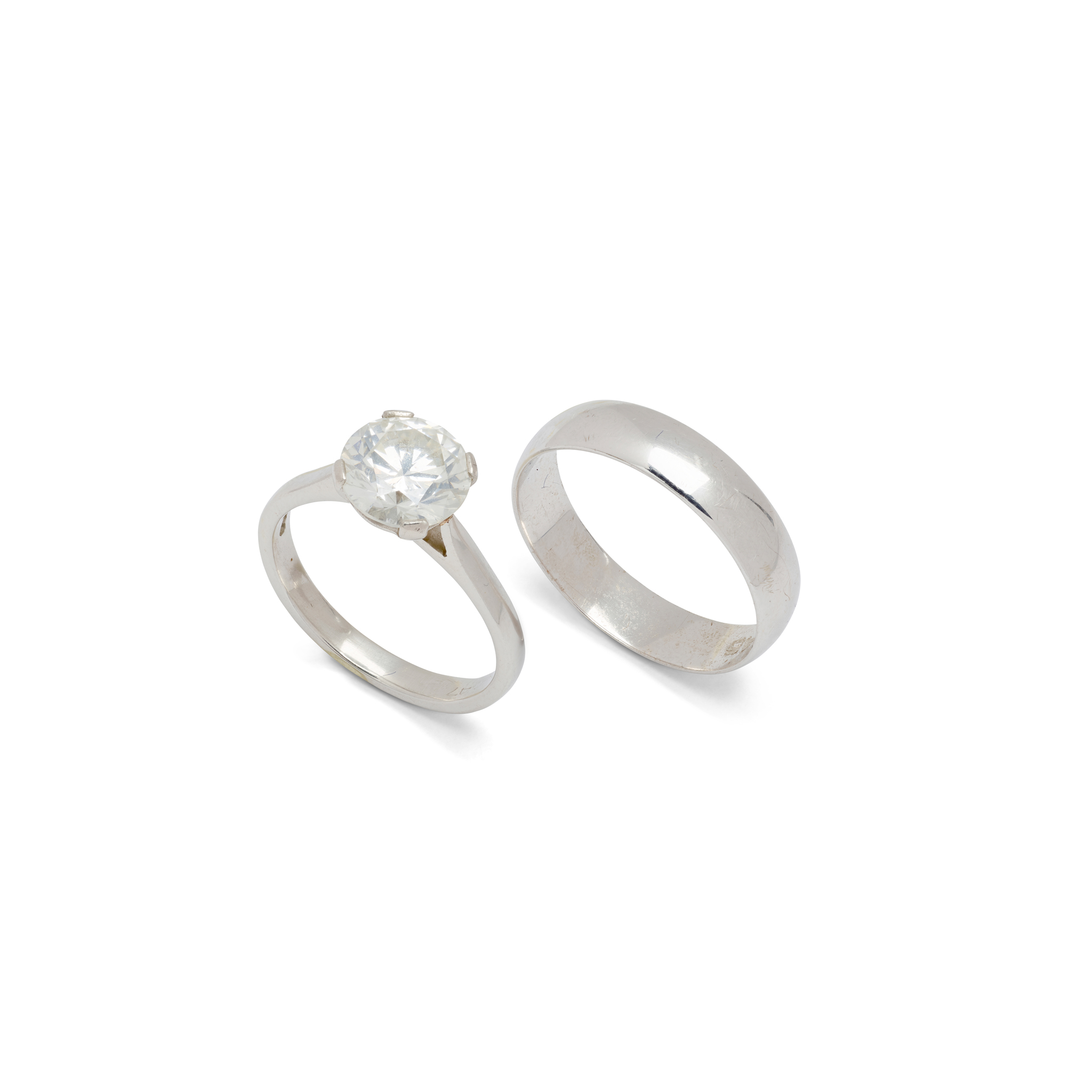 A platinum diamond single-stone ring and band