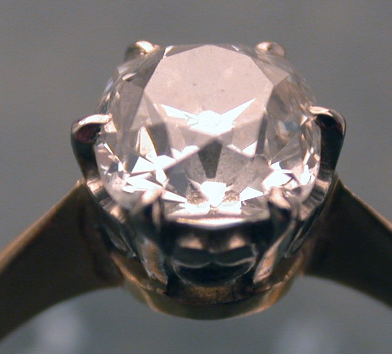 A solitaire diamond ring,