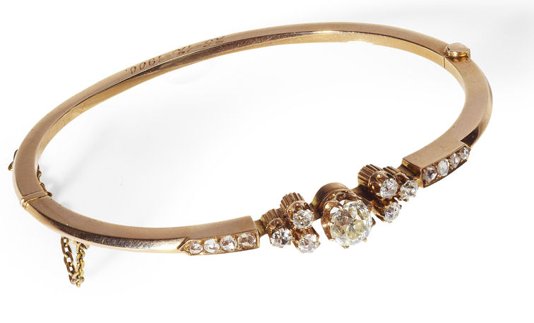 A Victorian 18ct gold diamond set bangle