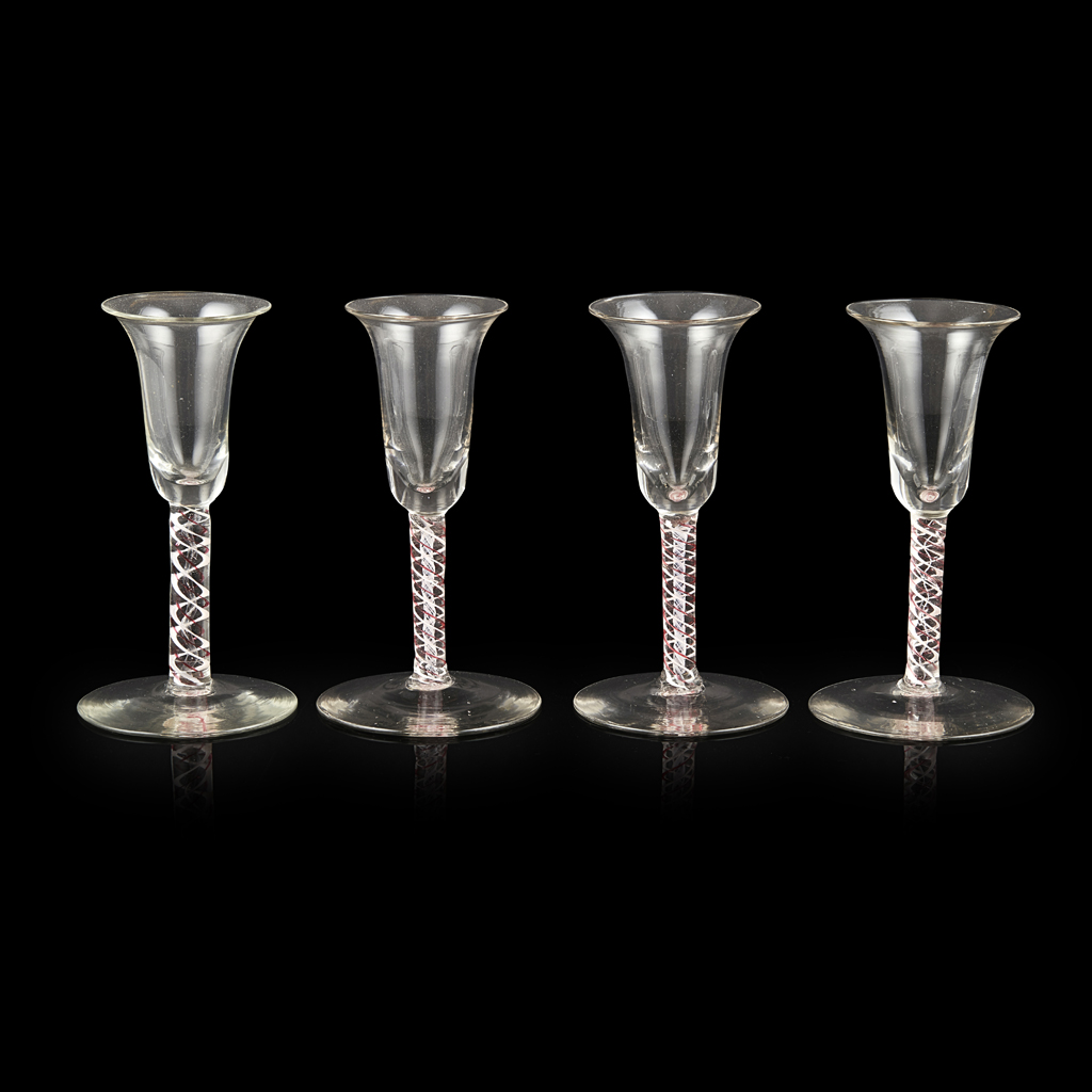 FOUR DUTCH OPAQUE AND RED ENAMEL TWIST STEM WINE GLASSES