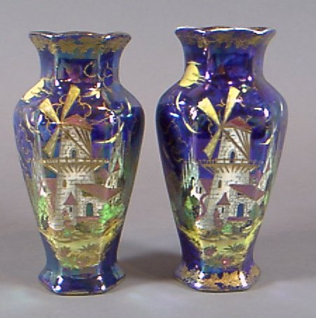 A near pair of Maling baluster lustre vases