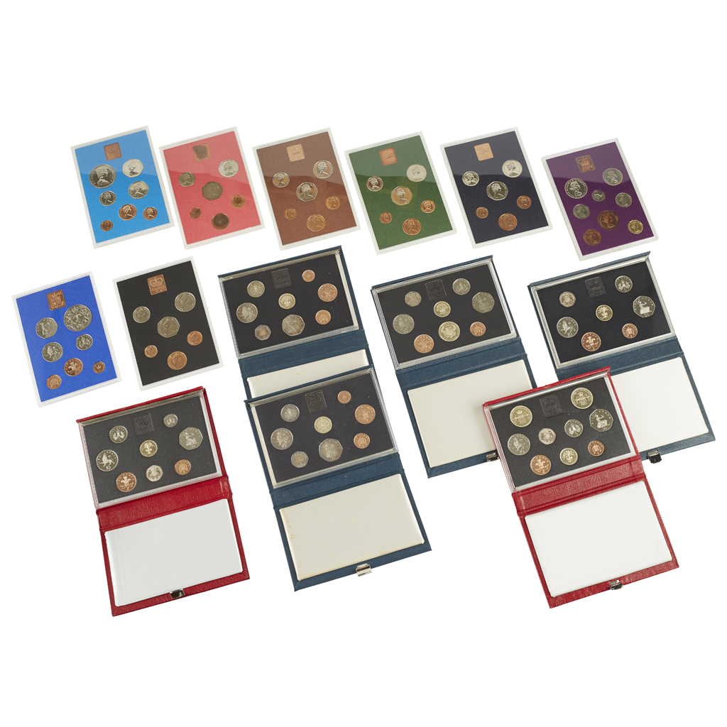 GB Various year coin sets, cased