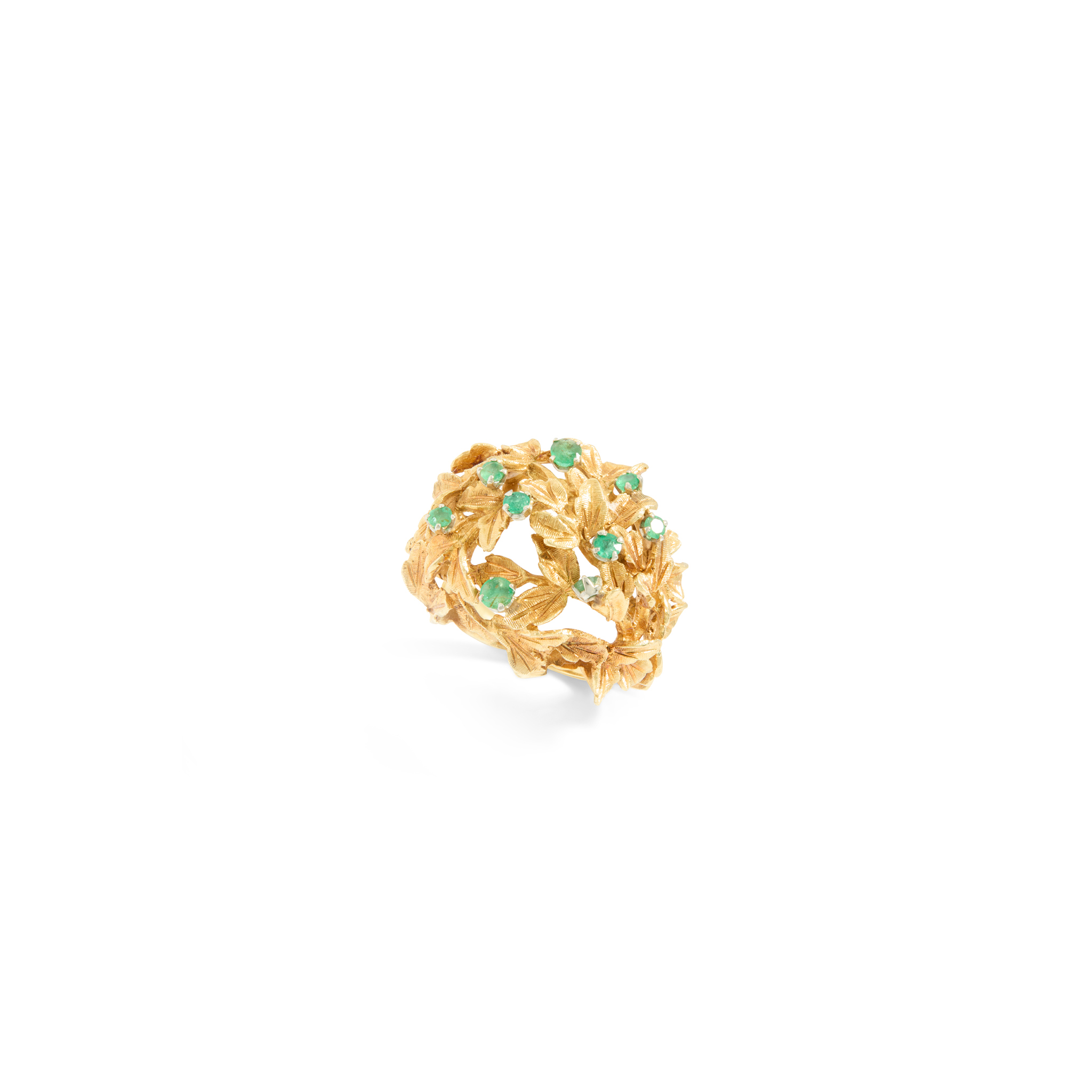 An emerald bombé ring