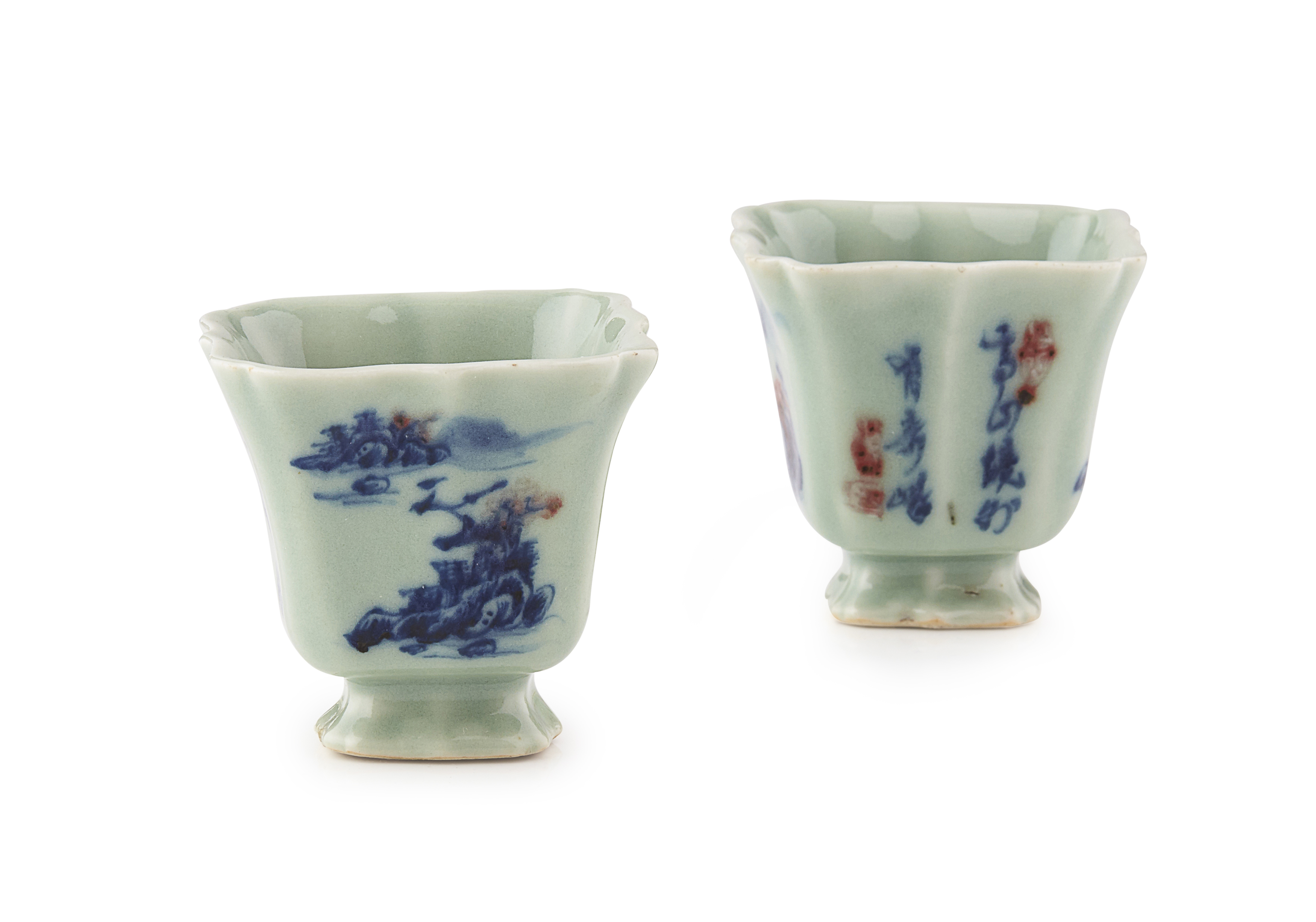PAIR OF UNDERGLAZE BLUE AND RED-DECORATED CELADON-GROUND CUPS
