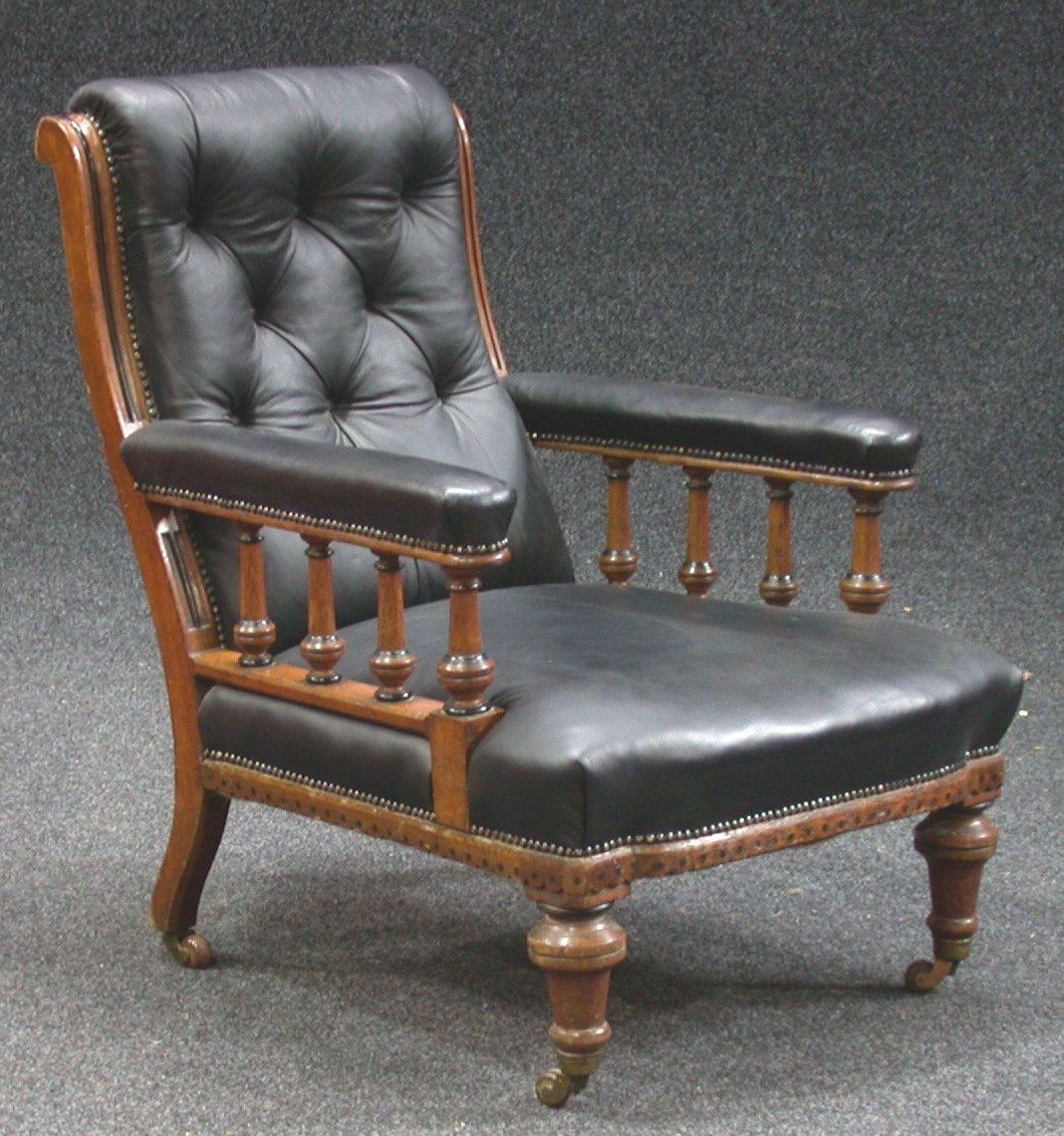 A Victorian mahogany framed armchair,