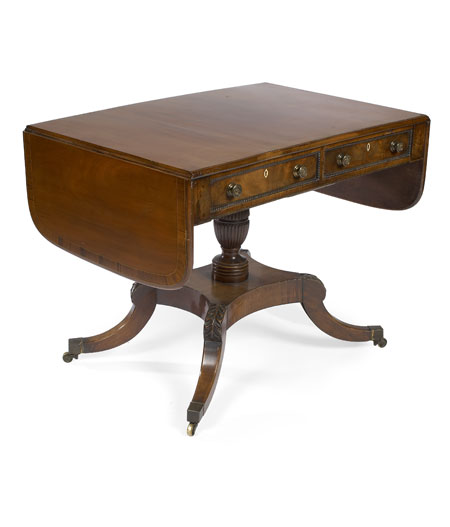 A Regency period mahogany and rosewood crossbanded sofa table