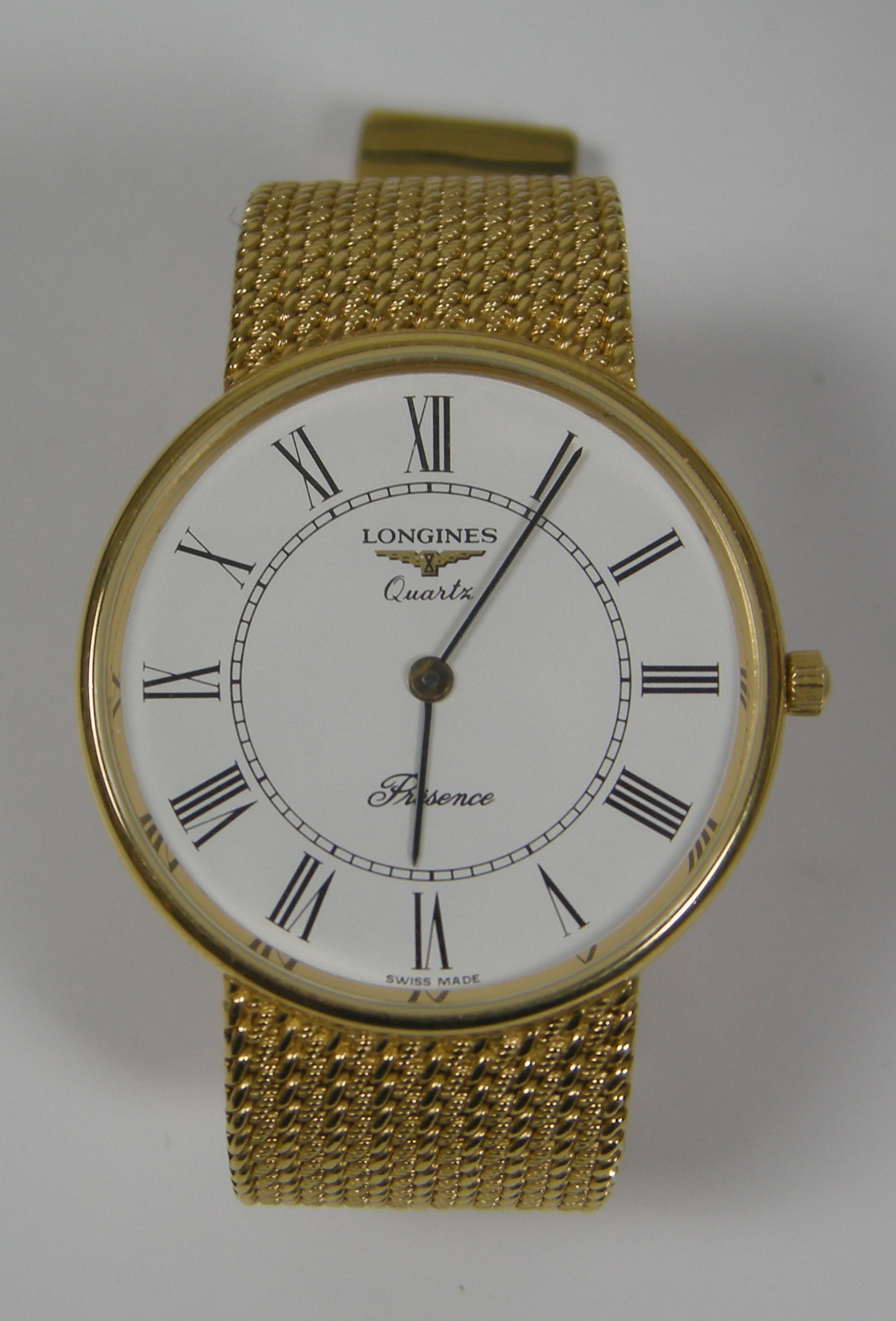 Longines; a gent's 9ct gold wrist watch