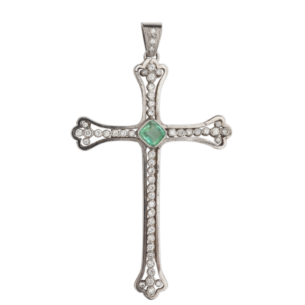 An early 20th century emerald and diamond set cross form pendant