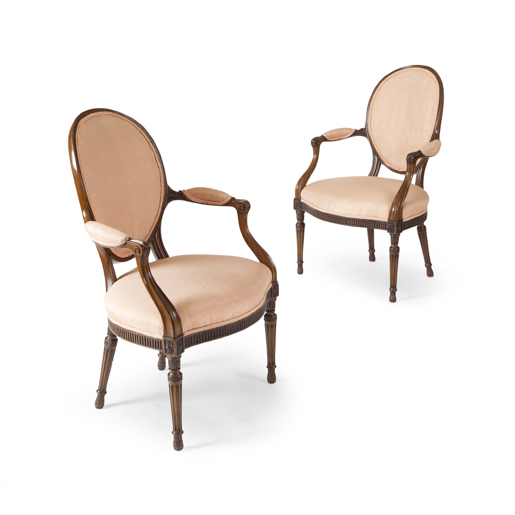 A PAIR OF GEORGE III MAHOGANY OPEN ARMCHAIRS