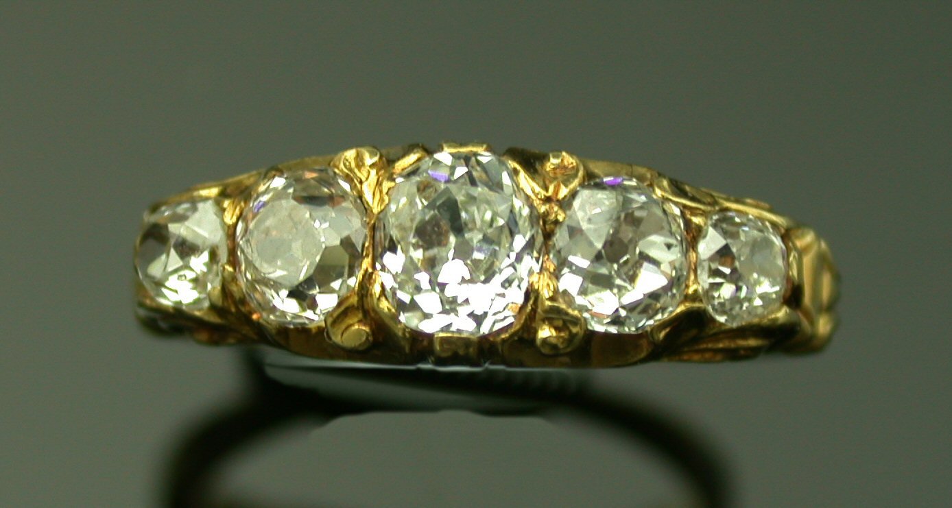 A Victorian gold mounted five stone diamond ring,