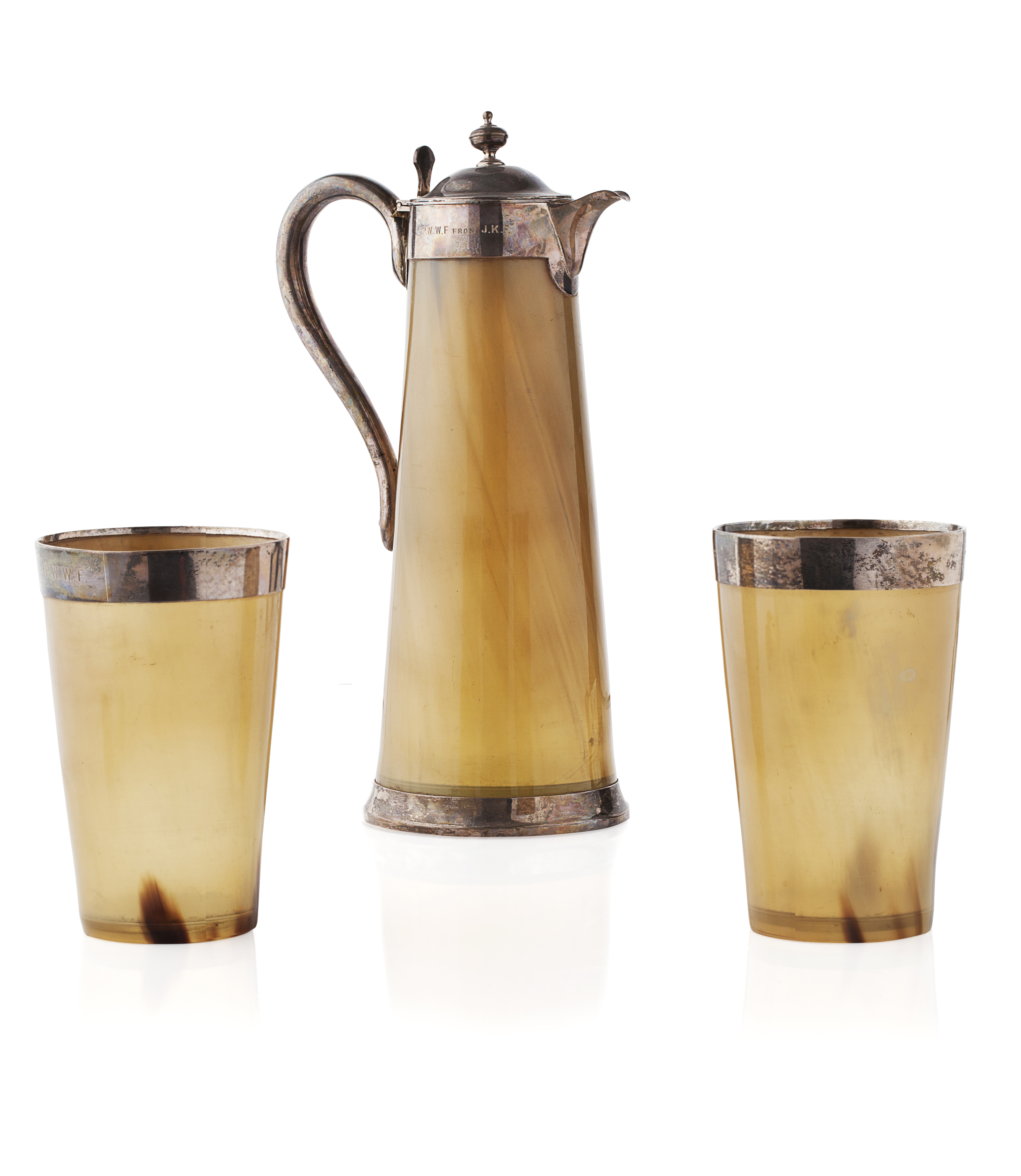 A silver mounted horn lidded tall jug and a pair of beakers