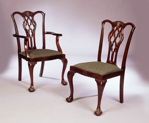 A set of six early George III style mahogany dining chairs