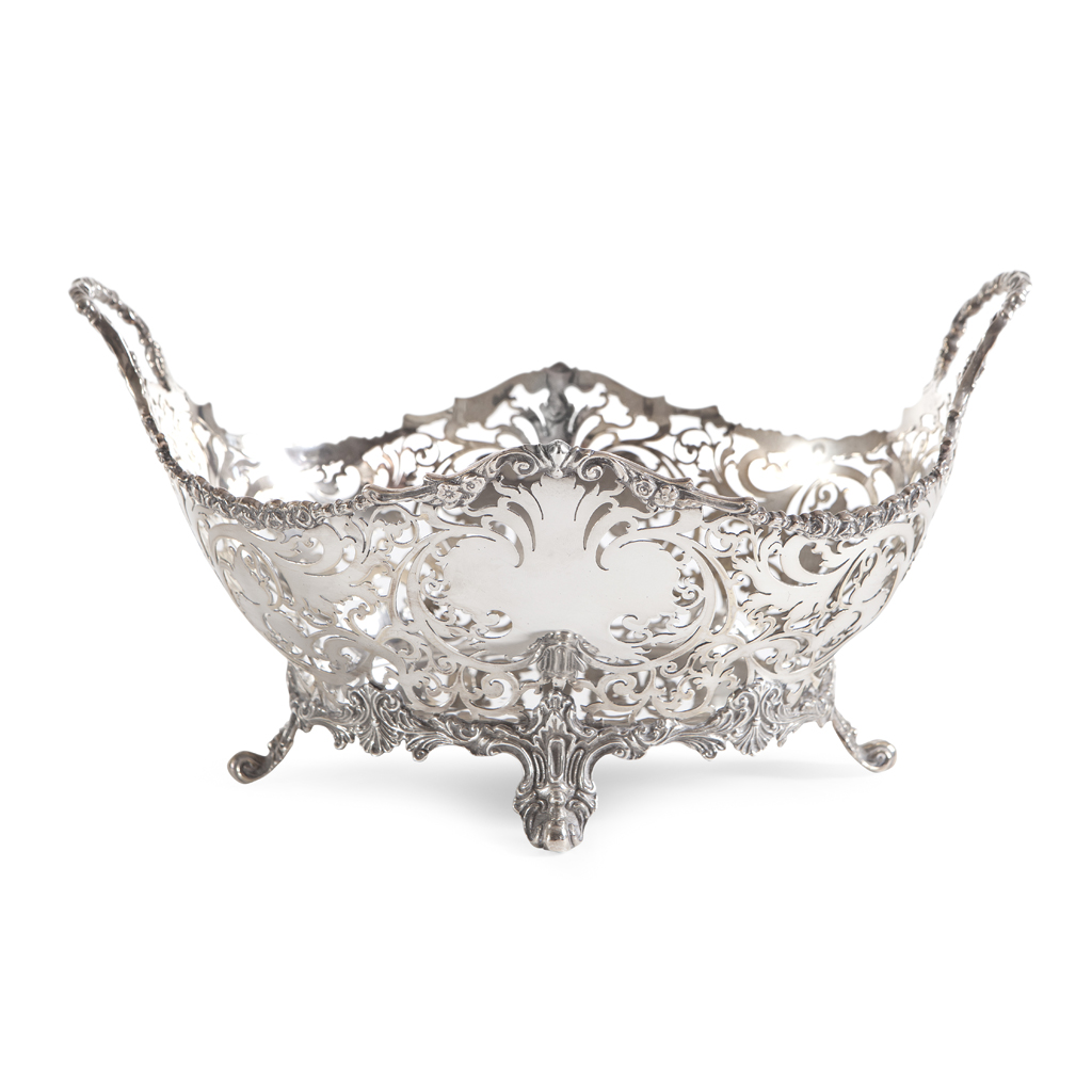 A GEORGE V RETICULATED SILVER BASKET