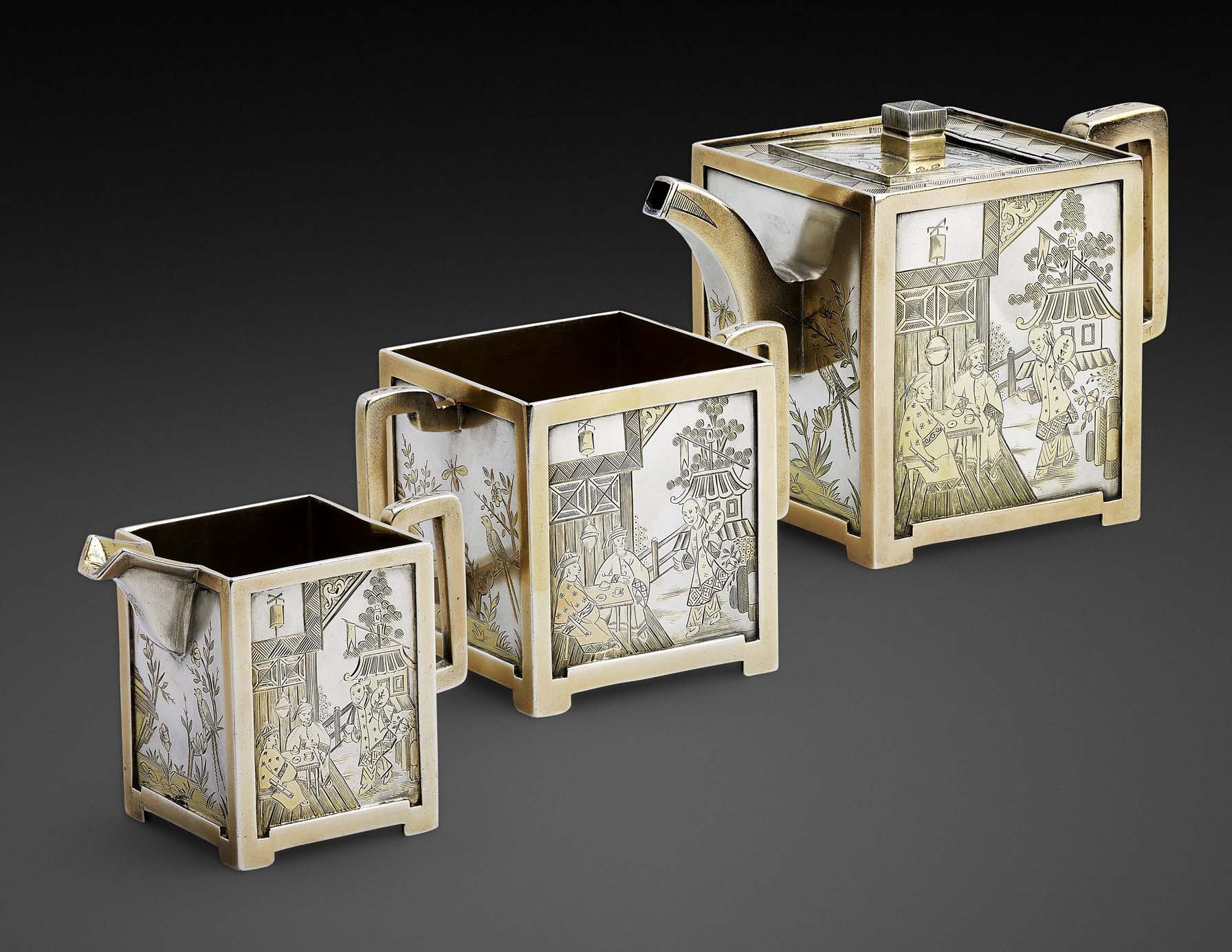An Aesthetic movement three-piece plated and parcel gilt small tea service