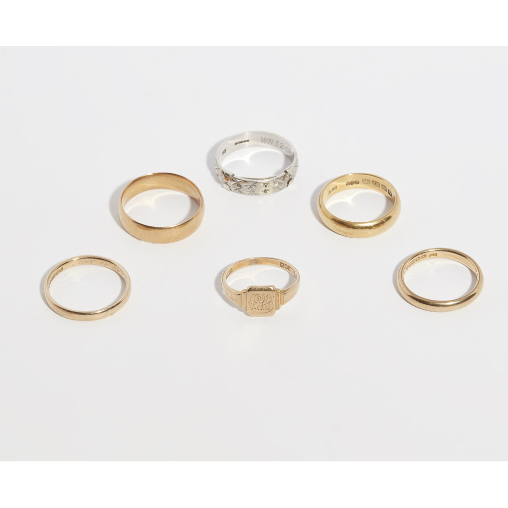 A collection of gold bands