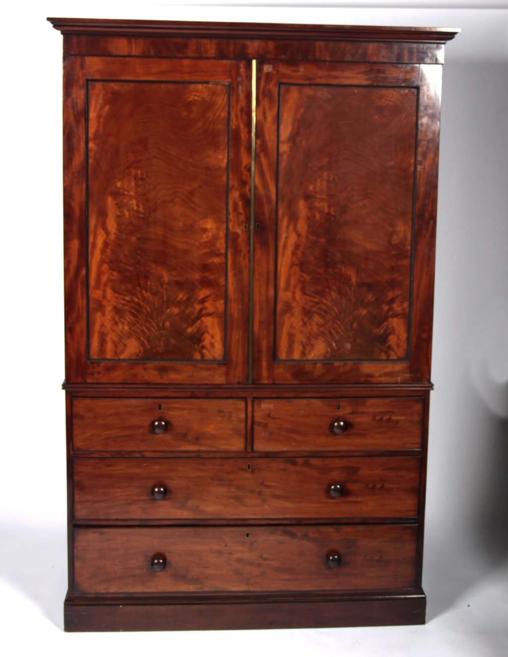 A Victorian mahogany linen press