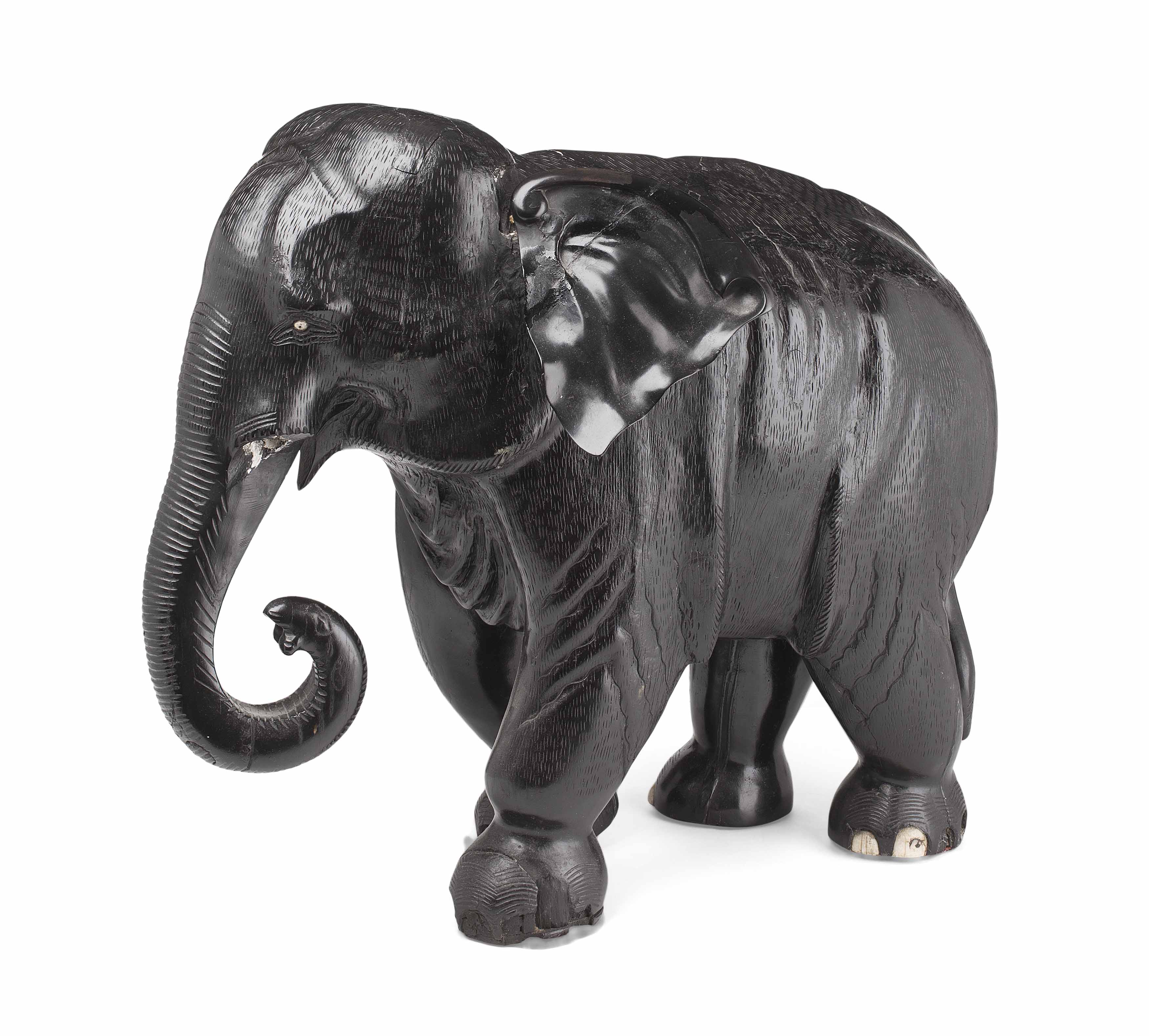 TWO LARGE INDIAN CARVED EBONY ELEPHANTS