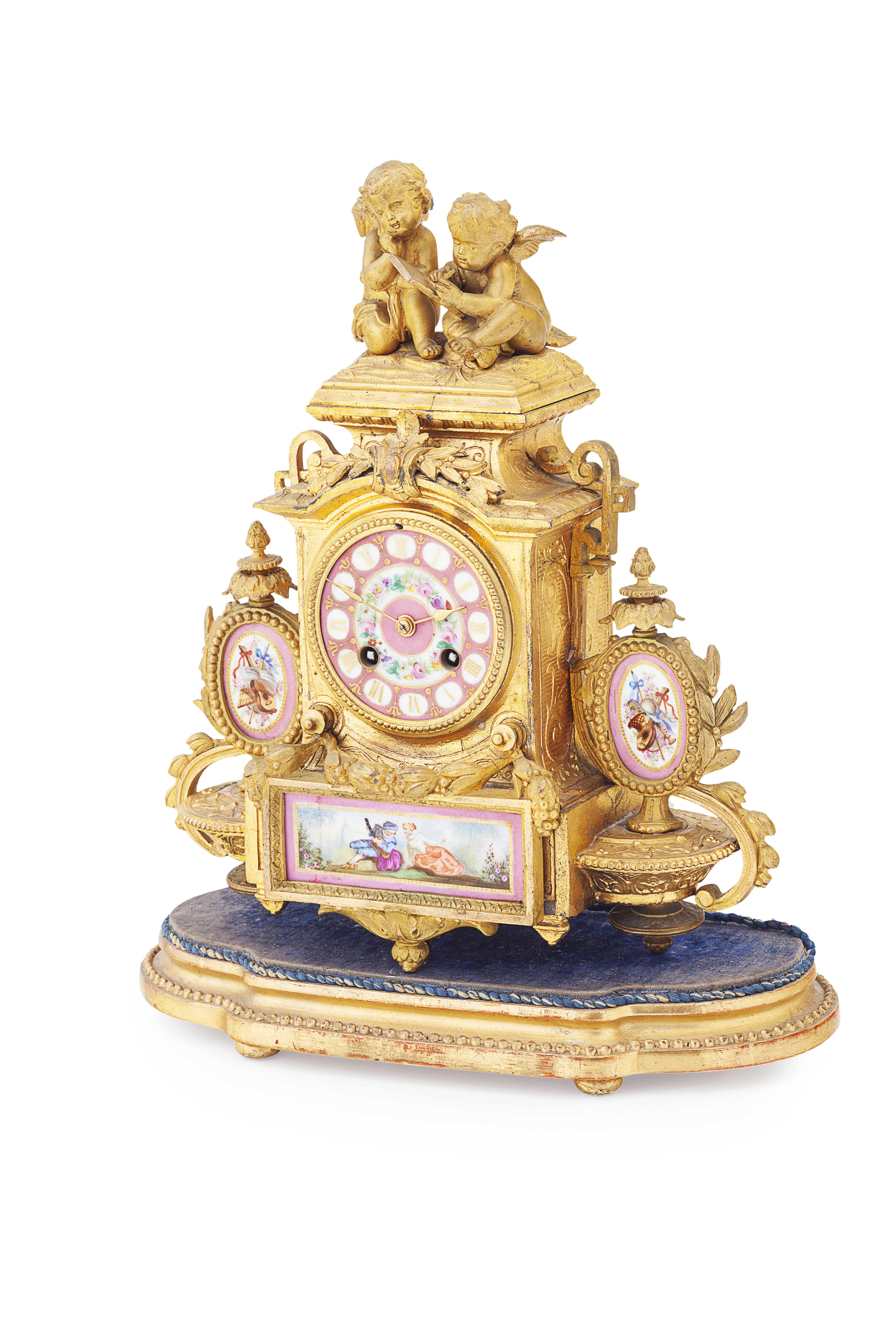 FRENCH GILT BRONZE AND PORCELAIN MOUNTED MANTEL CLOCK