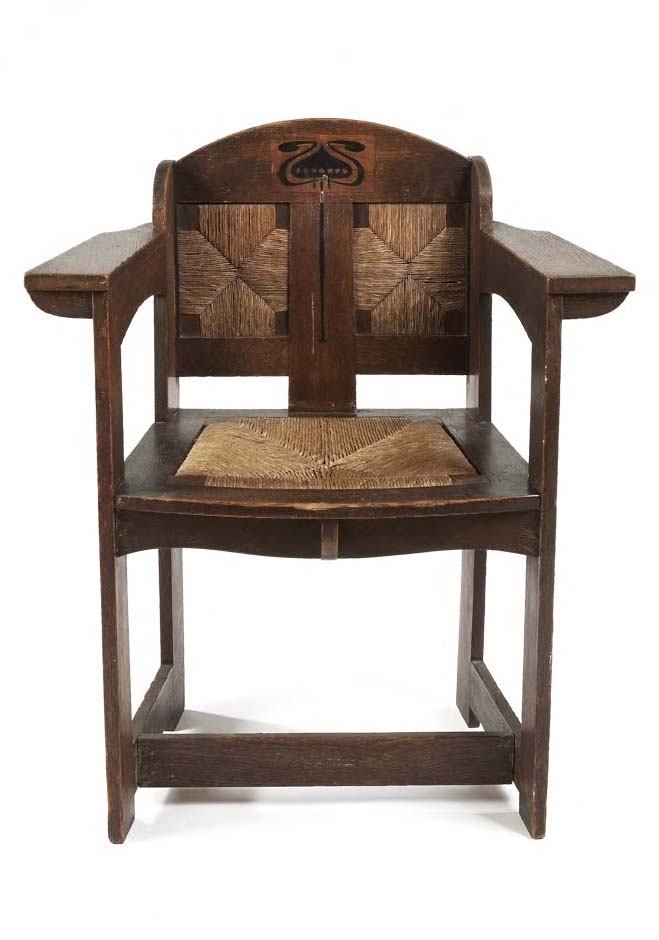 An E. G. Punnett Arts & Crafts oak and ebony-inlaid chair,