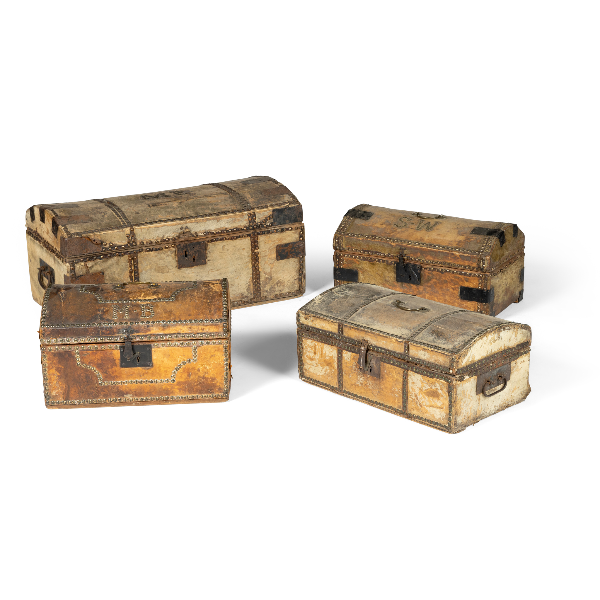 A GROUP OF THREE DOMED PONY SKIN TRUNKS