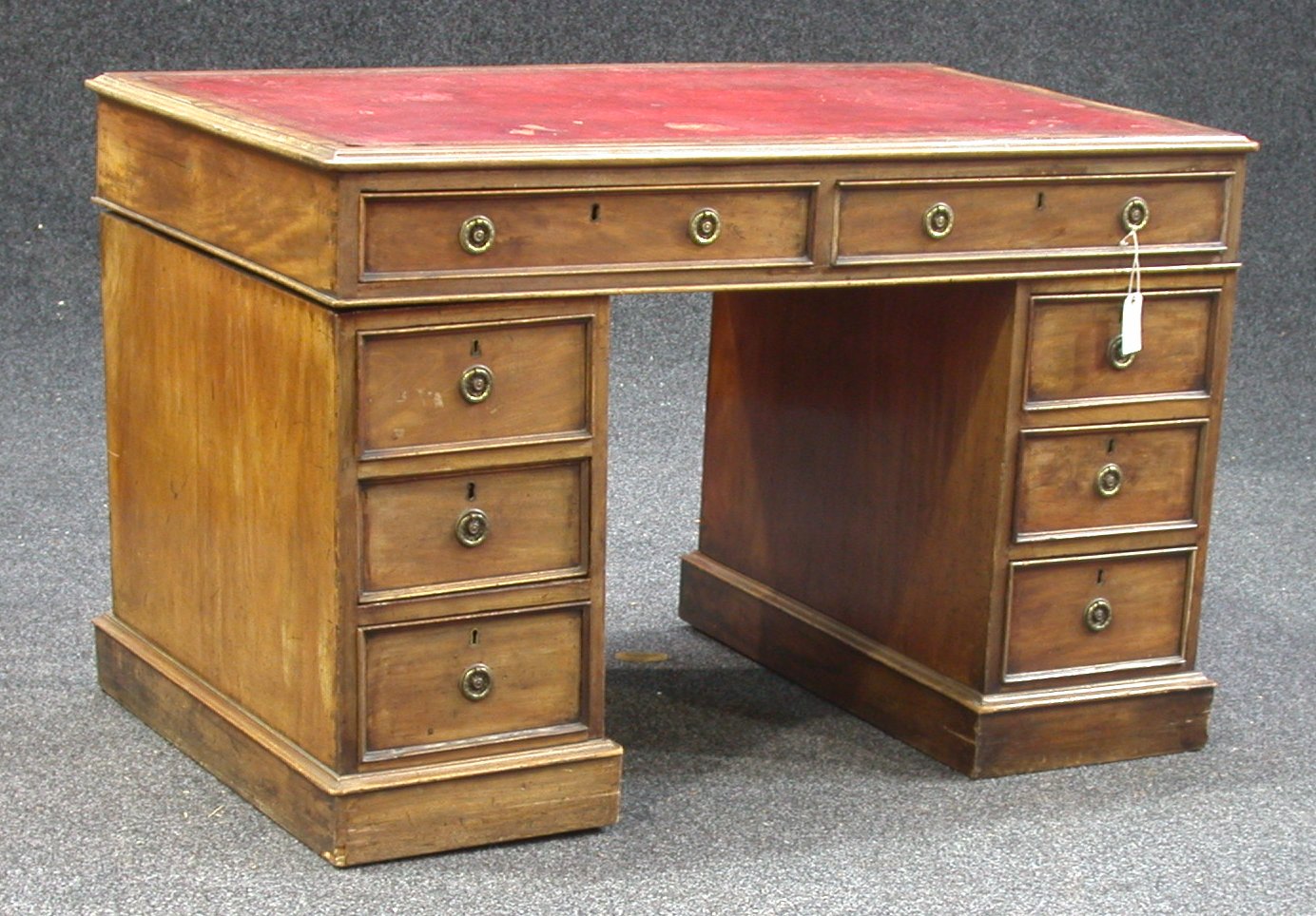 A late 19th century mahogany twin pedestal desk,