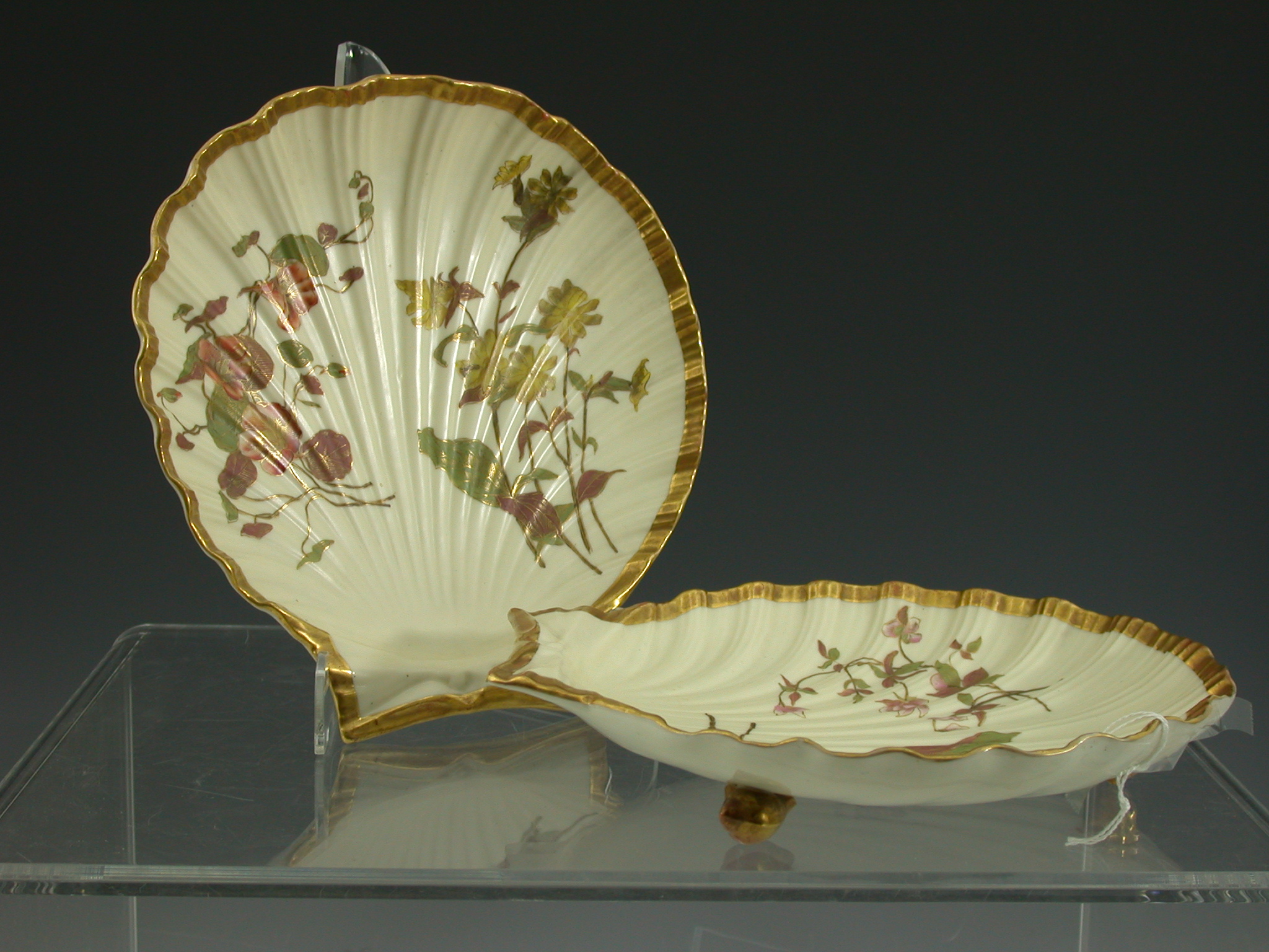 A pair of Royal Worcester scallop moulded bowls