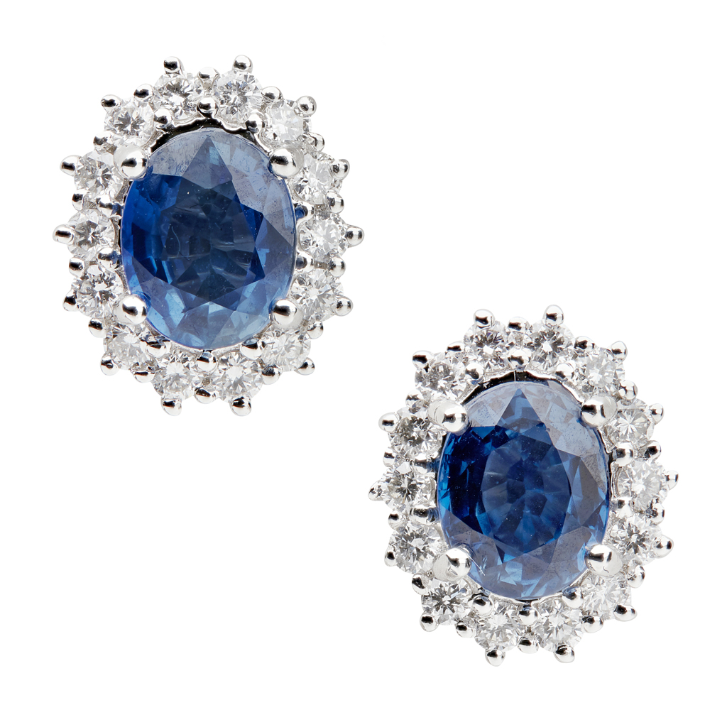 A pair of sapphire and diamond set cluster earrings