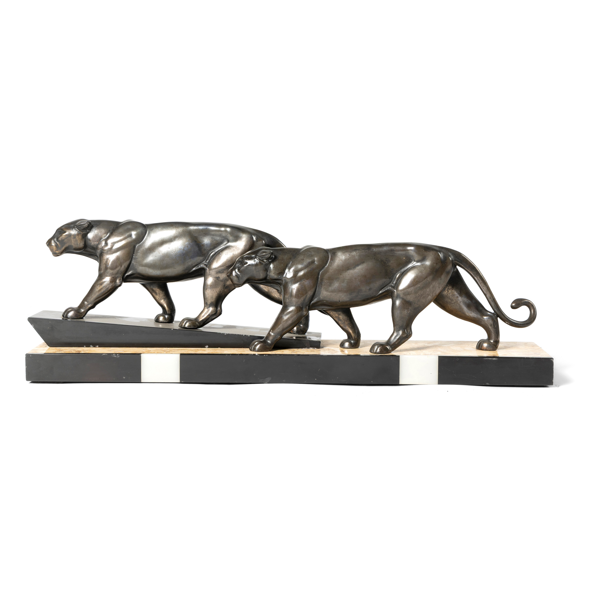 A BRONZED SPELTER PAIR OF ART DECO LIONS
