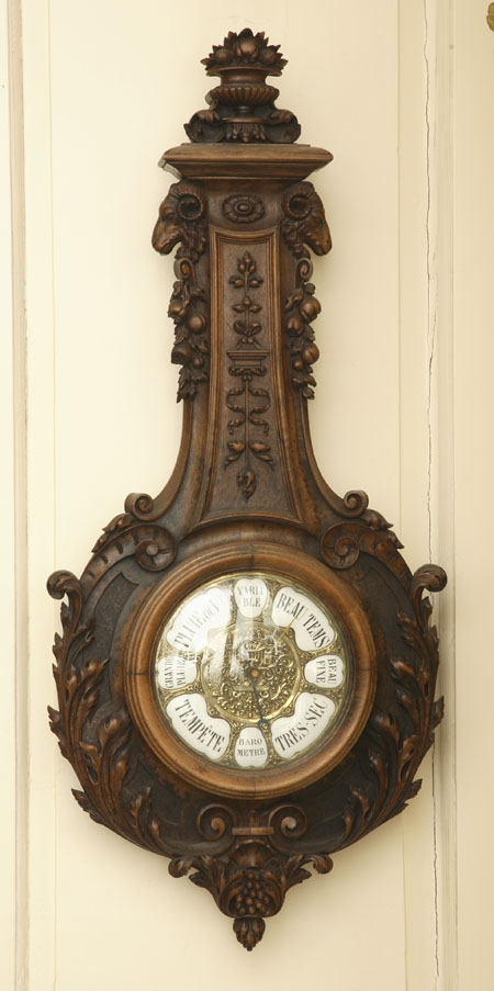 A late 19th century French walnut banjo clock and barometer pair