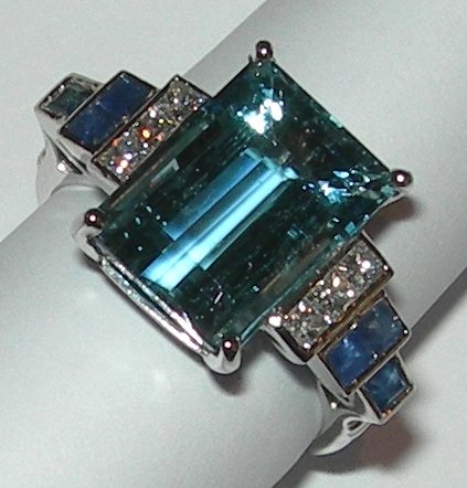 A modern multi-gem set ring,