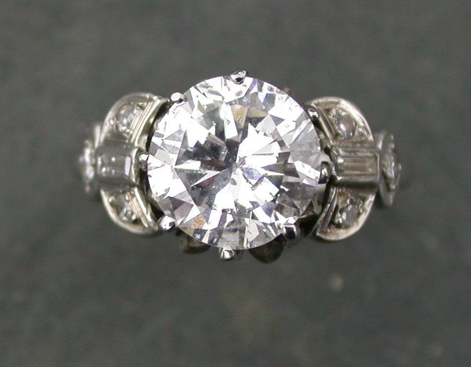 A solitaire diamond ring,