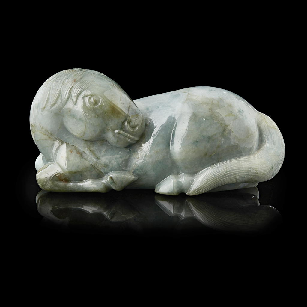 JADEITE FIGURE OF A RECUMBENT HORSE