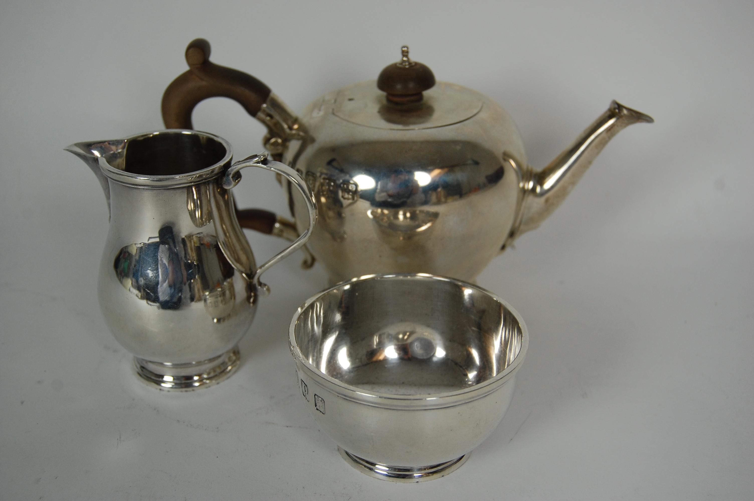 A three piece Britannia standard batchelor's tea service
