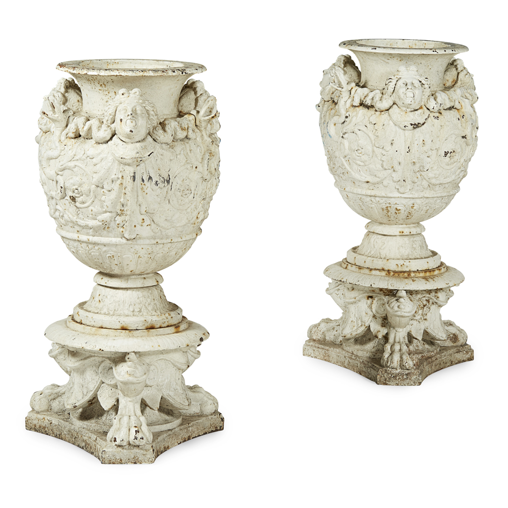 PAIR OF WHITE PAINTED CAST IRON GARDEN URNS
