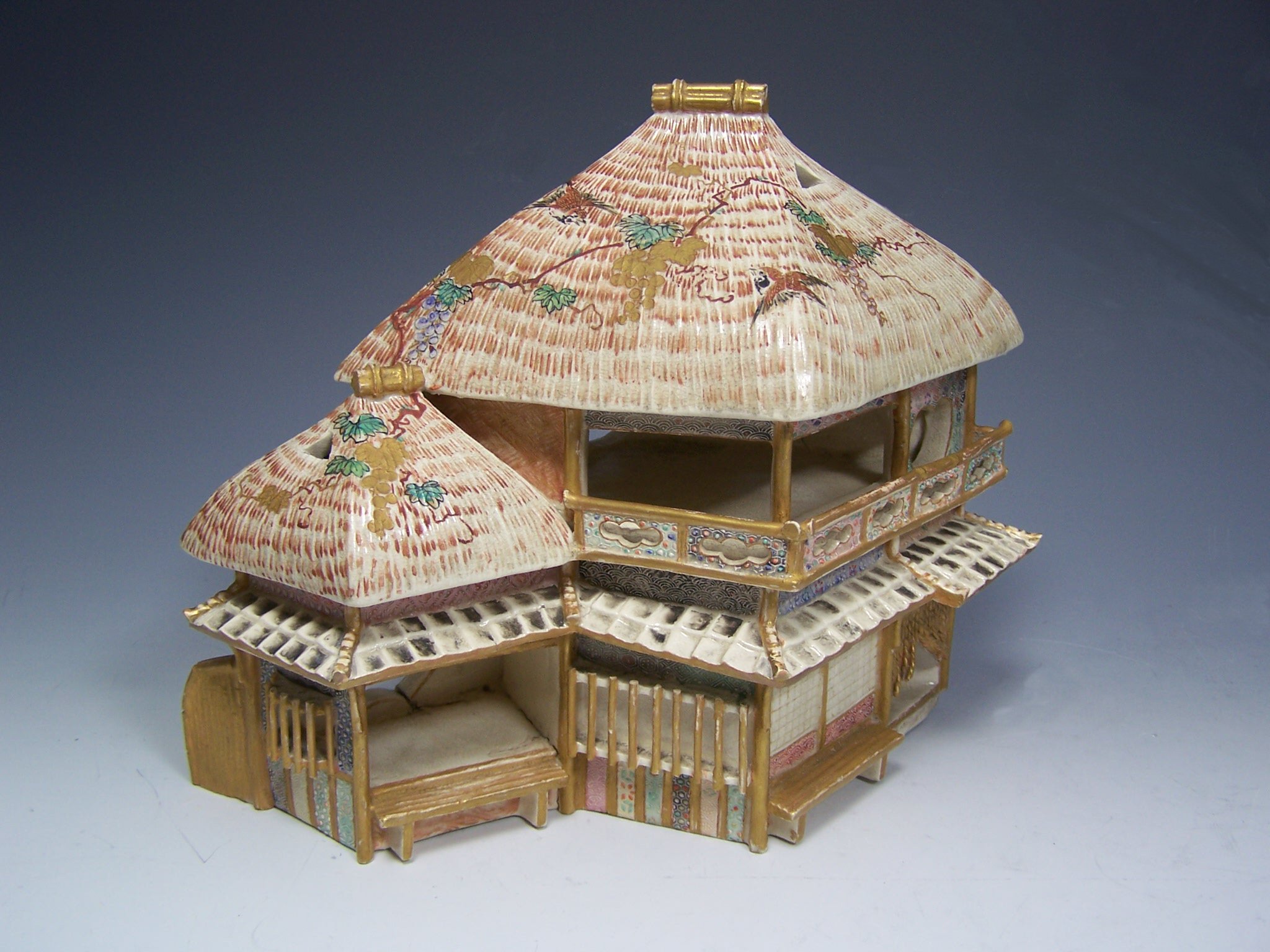 A Japanese satsuma house form box