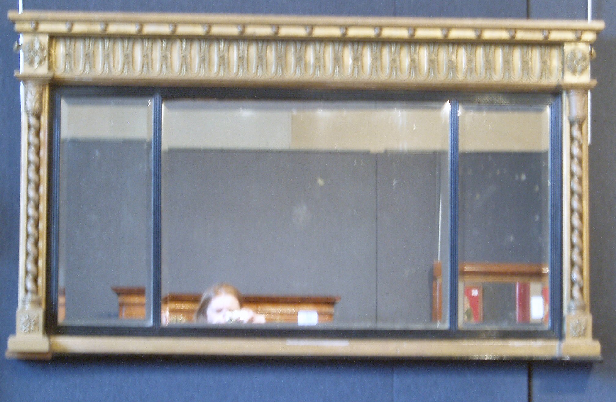 A Regency giltwood overmantle mirror,