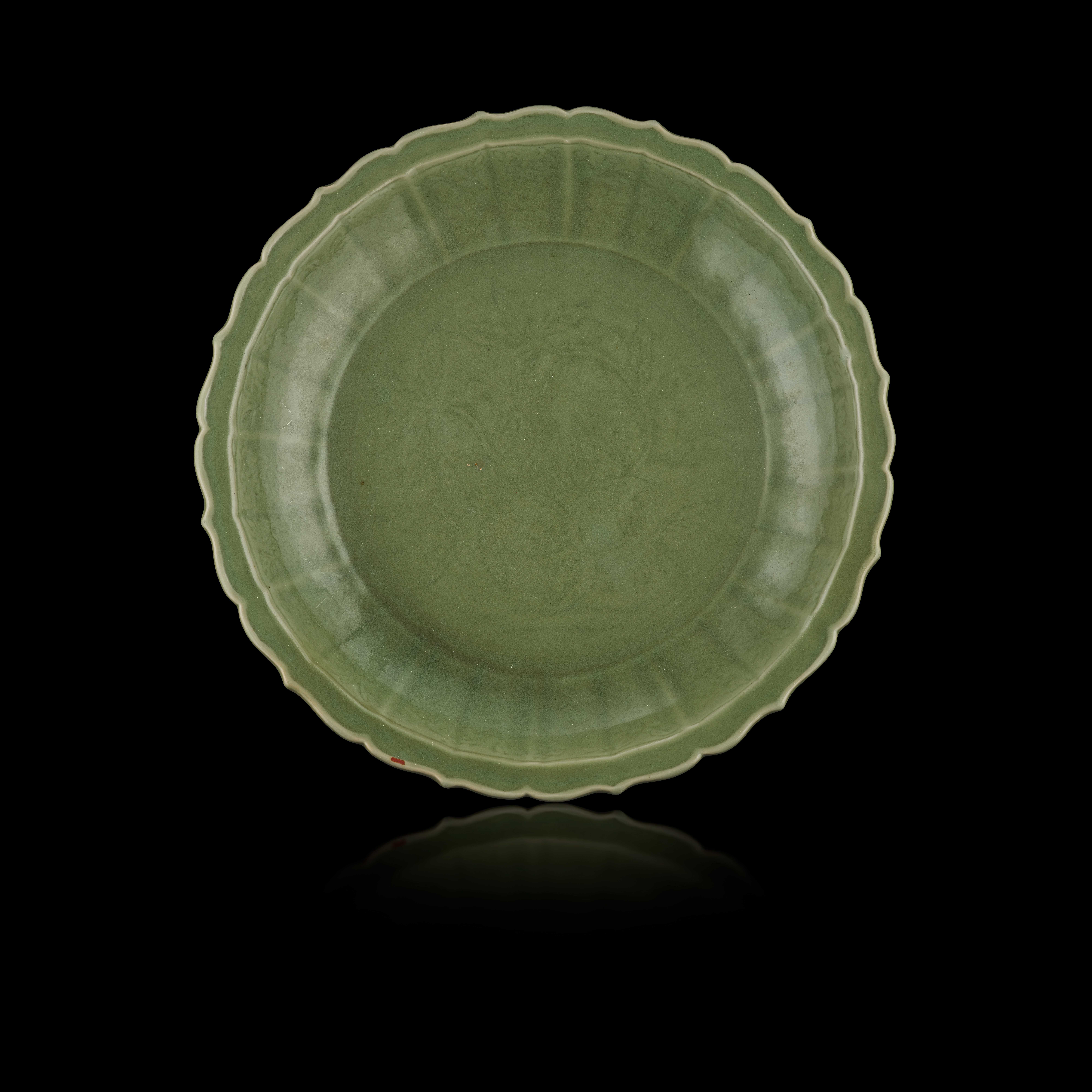 RARE AND LARGE CHINESE LONGQUAN CELADON-GLAZED 'LOQUAT' BARBED-RIM CHARGER