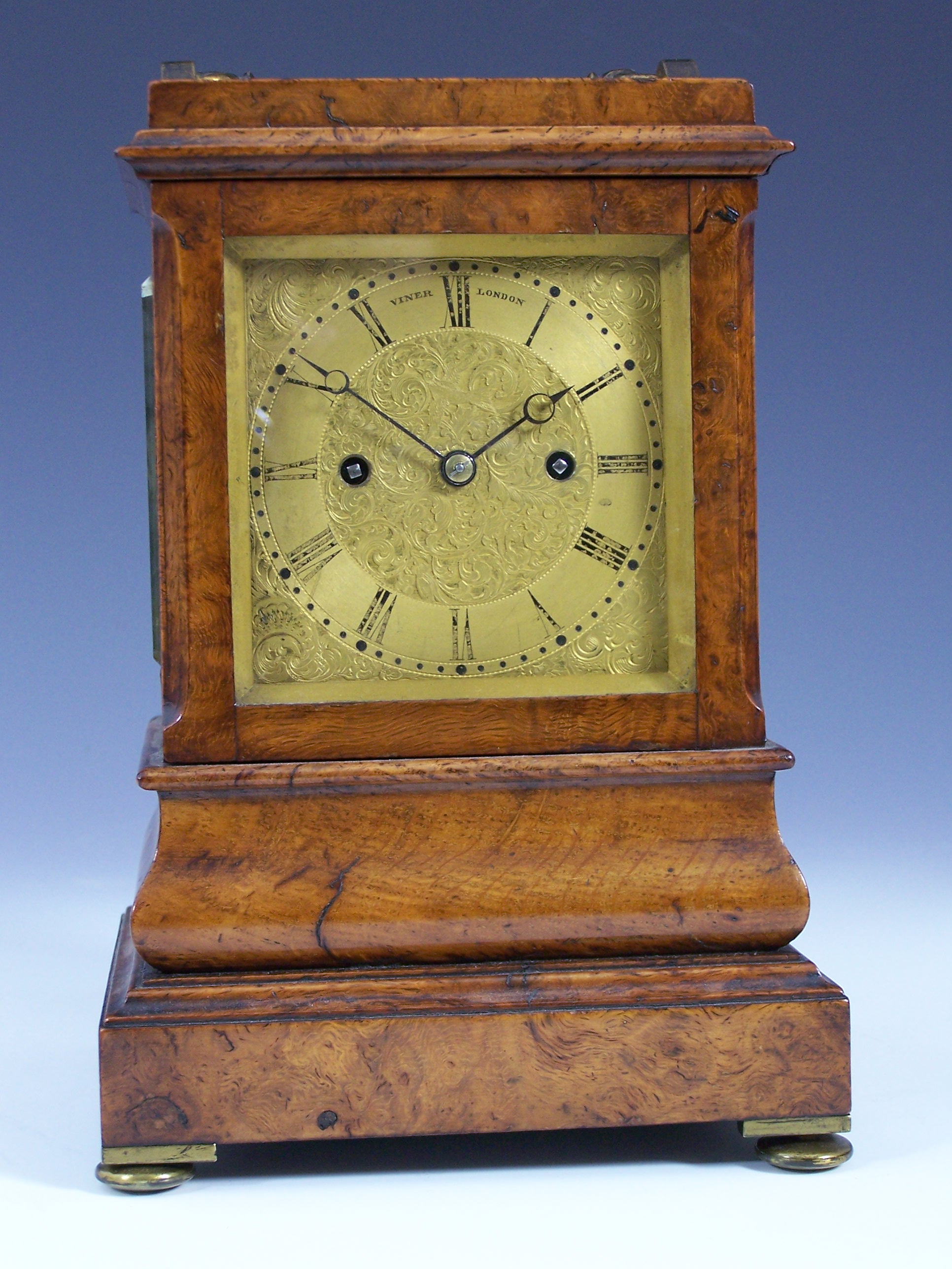 Viner, London A 19th century pollard oak 8-day mantel clock,