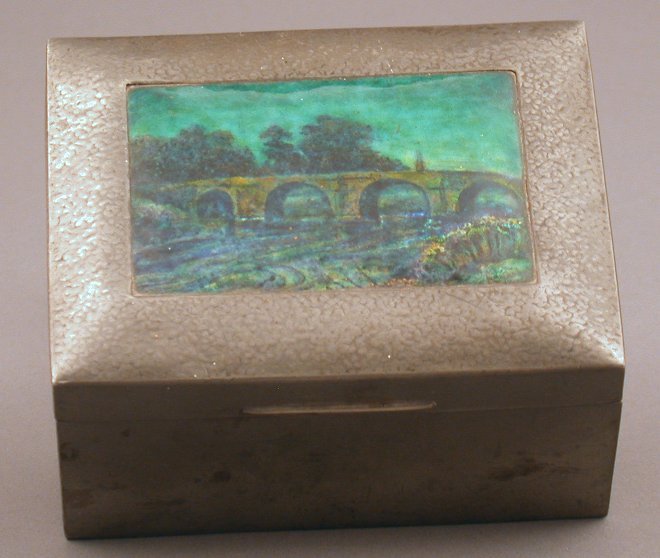 A Liberty & Co pewter box and cover