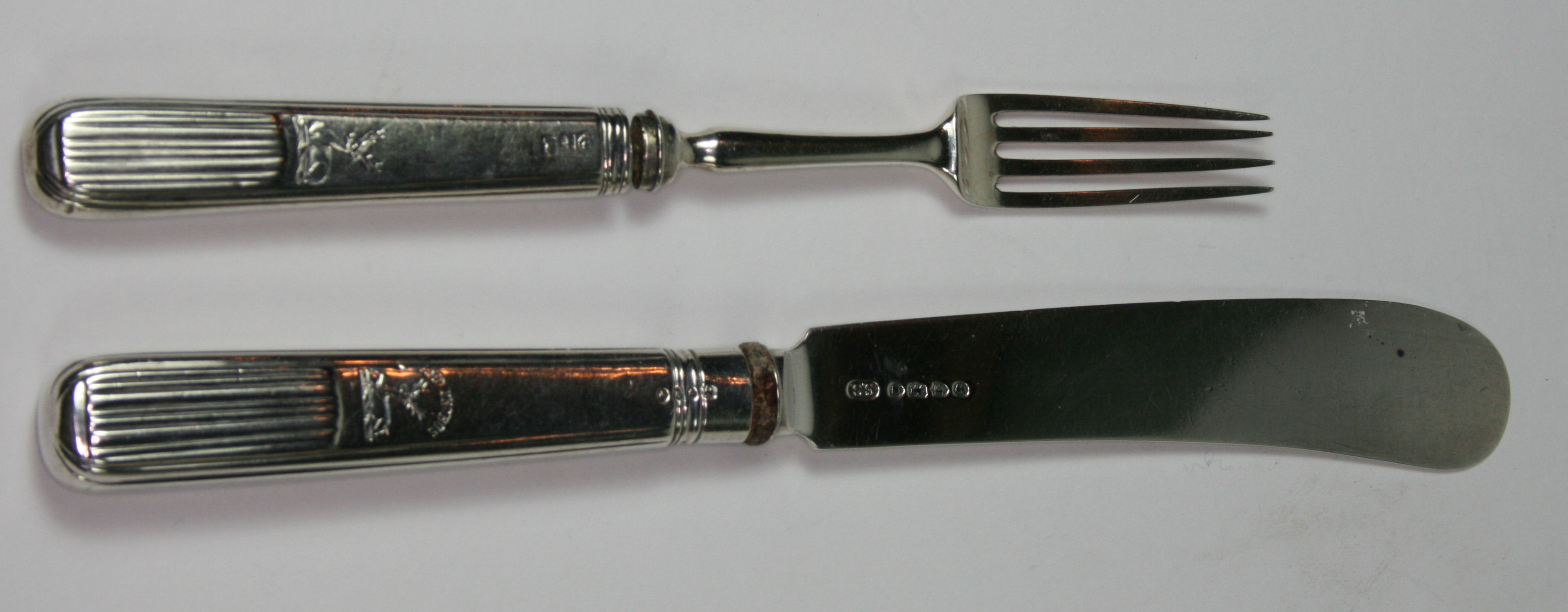 GROUP OF SILVER TABLE KNIVES AND FRUIT KNIVES AND FORKS