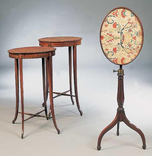 A George III mahogany and boxwood strung adjustable snap-top table