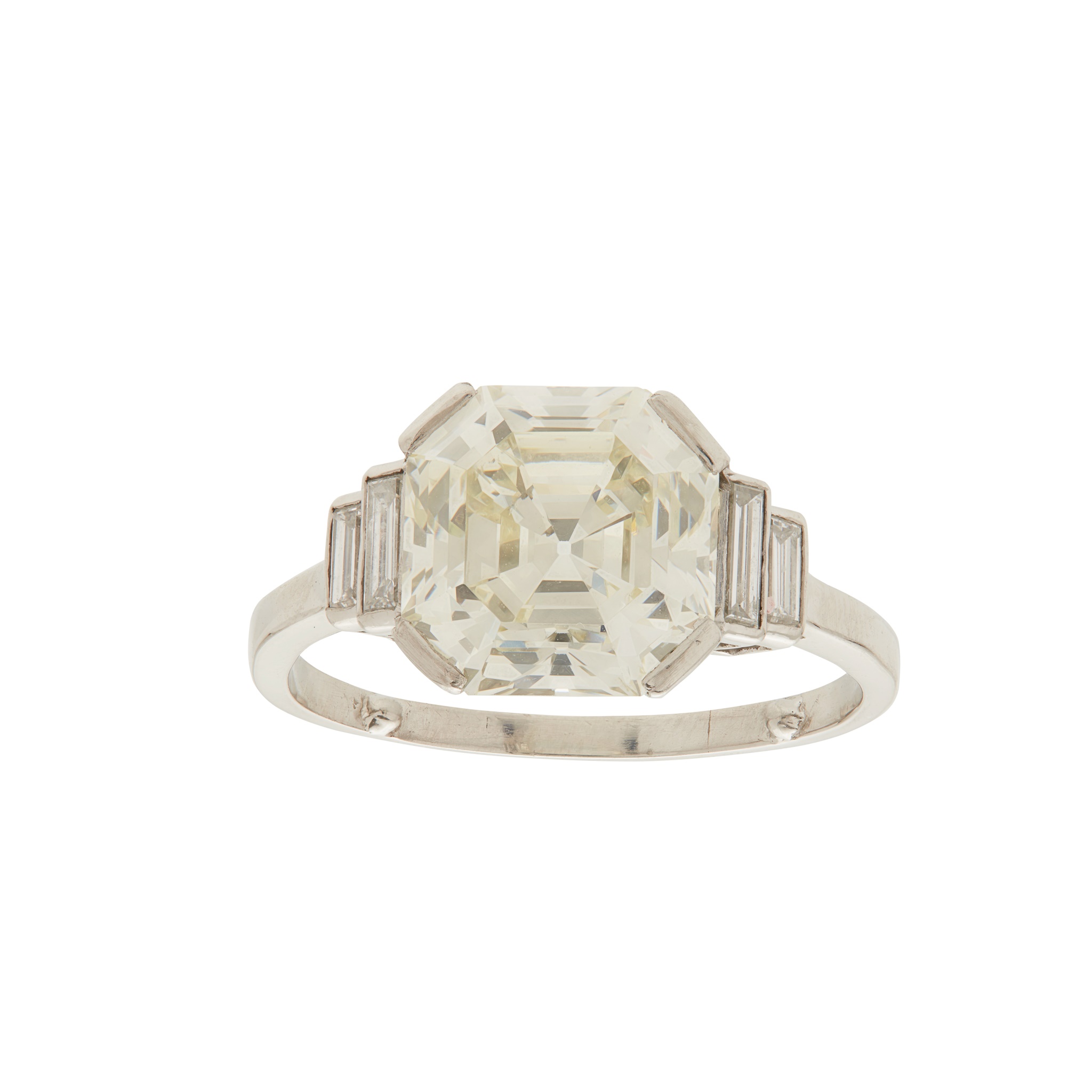 An Asscher-cut diamond set ring