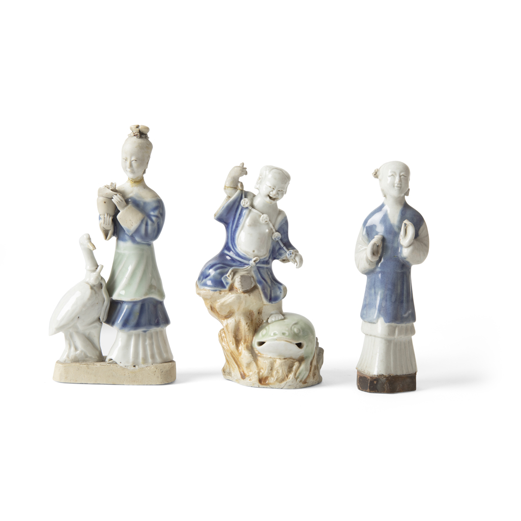 THREE CELADON AND BLUE GLAZED FIGURES